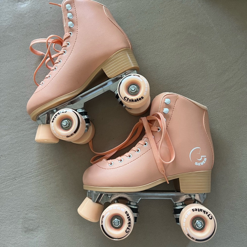 C7 Peach Roller Skates